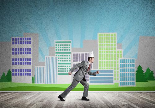 Young handsome businessman wearing white paper crown running in a hurry