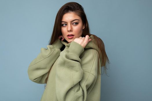 Portrait photo of nice cute sweet lovely lovable attractive adorable charming cheerful glad young woman isolated over colourful background wall.