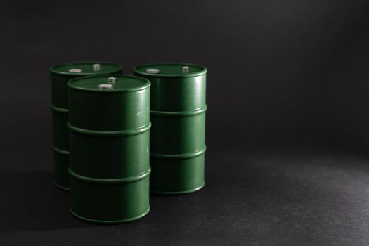 oil barrels on black background.