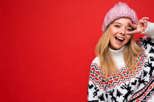 Photo of cute nice winsome positive adult woman wearing casual outfit isolated on background wall with copy space.