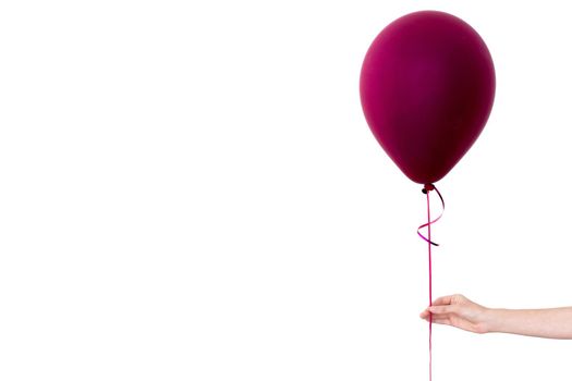 Womans hand holds purple balloons white background isolated