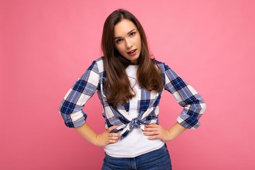 Photo shot of cute nice charming gorgeous attractive pretty youngster woman wearing stylish clothes isolated over colorful background with copy space.