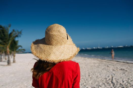woman in hat on island landscape summer tropics. High quality photo
