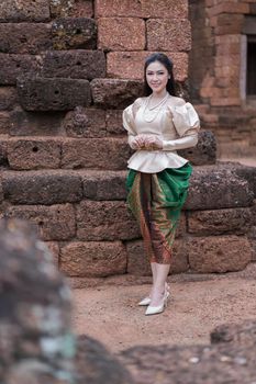 happy beautiful woman in Thai traditional dress 