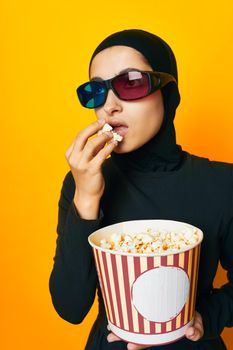 Muslim watching movies 3D glasses fun studio lifestyle. High quality photo
