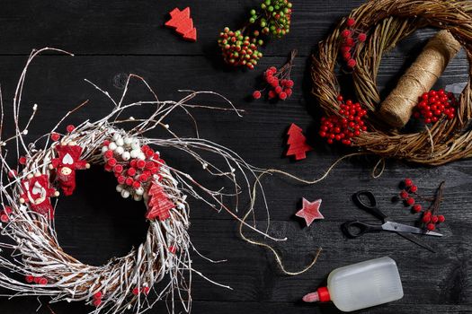 Make a Christmas wreath with your own hands. Workplace for preparing handmade decorations. Top view. Copy space. Still life. Flat lay