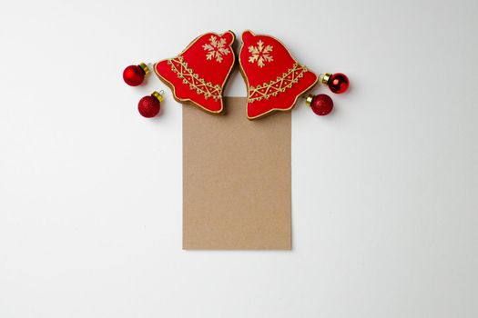 Blank paper and gingerbread Christmas cookie top view copy space
