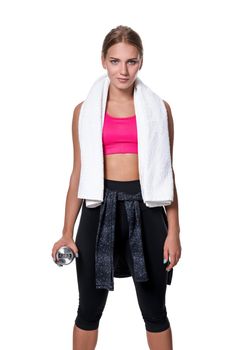 Portrait of sporty young woman tired after a gym workout. Woman with a white towel and a bottle of water isolated on white background