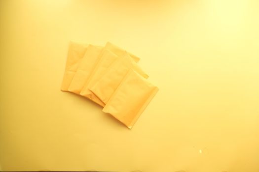 yellow paper bubble envelope on table ,