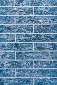 Blue vertical modern abstract brick wall texture background.