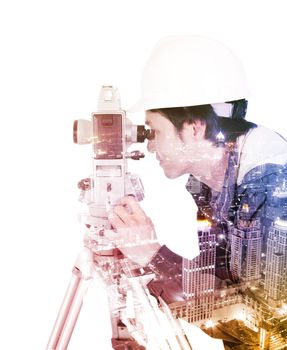 Double exposure of engineer working with survey equipment theodolite on a tripod against the city isolated on white background