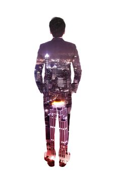 Double exposure of business man back against the city isolated on white background