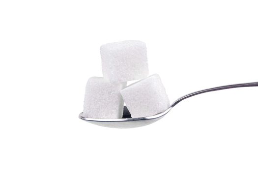 Spoon with white sugar on a white background