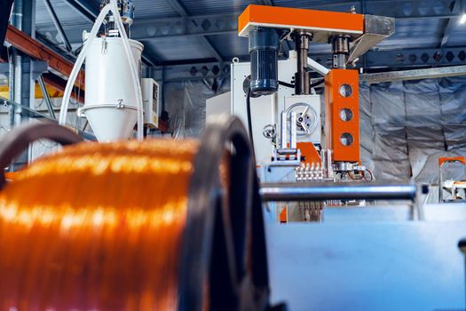 Production of copper wire, cable in reels at factory. Cable factory. Close up.