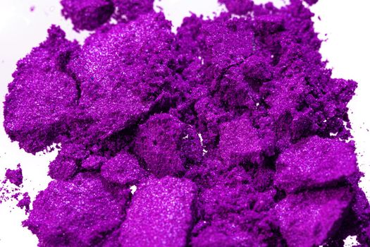 Smashed eyeshadows of bright purple color, make up concept