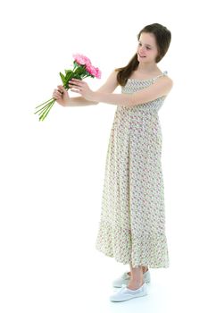 Little girl with a beautiful bouquet of flowers. The concept of holidays, family and children. Isolated on white background.