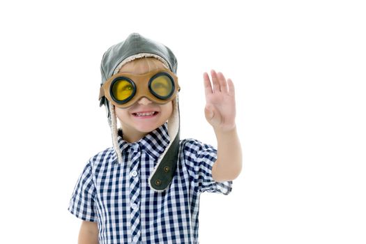 Cute little boy in helmet pilot. The concept of a happy childhood, the development of a child in the family. Isolated on white background.