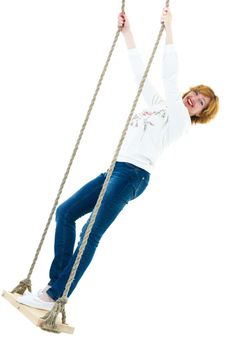 Beautiful young woman swinging fun on a swing. Concept summer vacation. Isolated on white background.