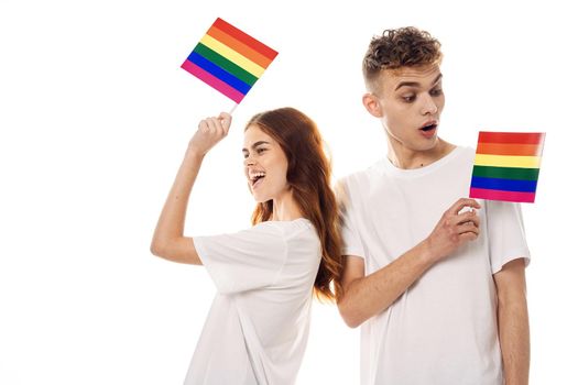 young couple lgbt Flag transgender lifestyle light background. High quality photo