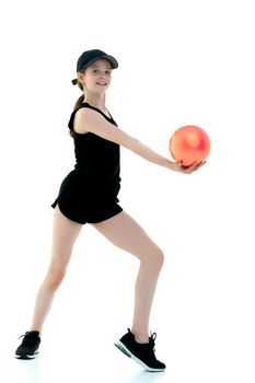 Beautiful little girl gymnast performs exercises with the ball. The concept of children's sports, fitness. Isolated on white background.