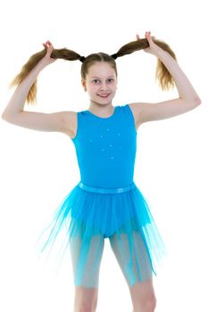 A beautiful little girl is pulling herself in pigtails. The concept of education, advertising, children's emotions. Isolated on white background.