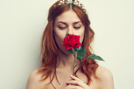 attractive woman with rose flower makeup romance model. High quality photo