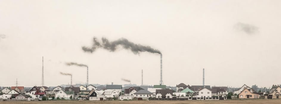 Dirty smoke from chimneys or pipes of a factory or industrial enterprise. Pollution of the environment and ecology.