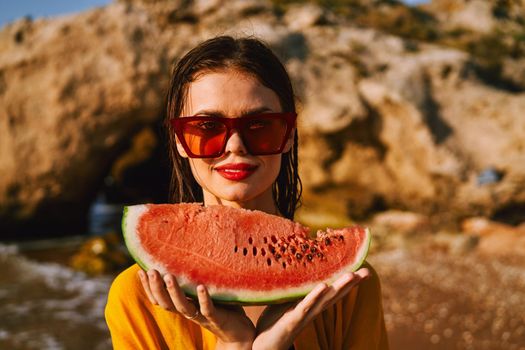 pretty woman with watermelon outdoors summer vacation. High quality photo