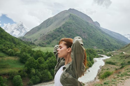 woman hiker mountains landscape travel fresh air. High quality photo