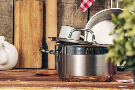 Set of cookware utensils on a kitchen counter. Close up.