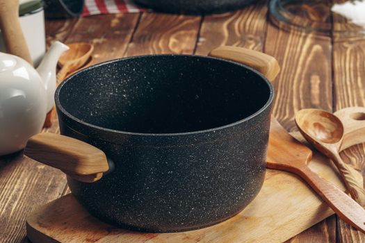Set of cookware utensils on a kitchen counter. Close up.