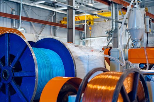 Production of copper wire, cable in reels at factory. Cable factory. Close up.