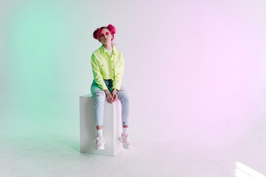 woman with pink hair teen fashionable clothes posing neon. High quality photo