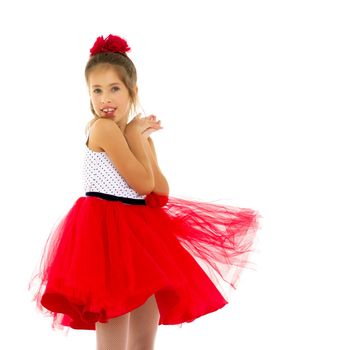 Beautiful little girl posing in the studio. Children's emotions concept. Close-up. Isolated on white background.