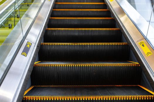 Escalator stairs close up photo in a shopping mall