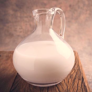 Fresh rice milk in glass pitcher. Helthy, lactose intolerance, diet and vegan concept.