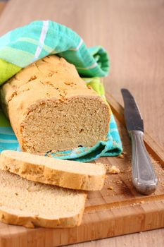 Fresh from the oven gluten free bread on a cutting board