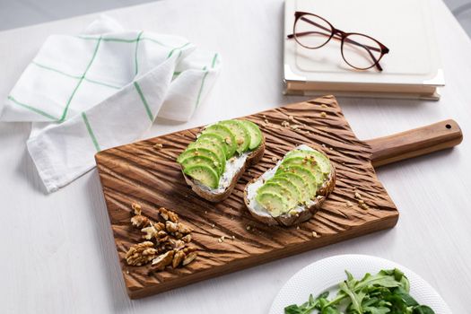 sliced avocado on toast bread with spices.