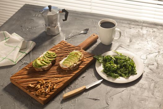 sliced avocado on toast bread with spices.