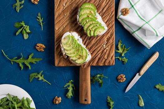 sliced avocado on toast bread with spices.