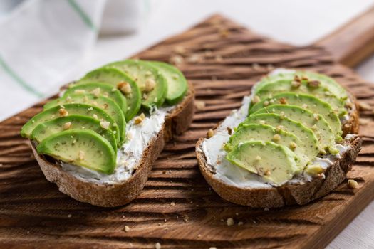 sliced avocado on toast bread with spices.
