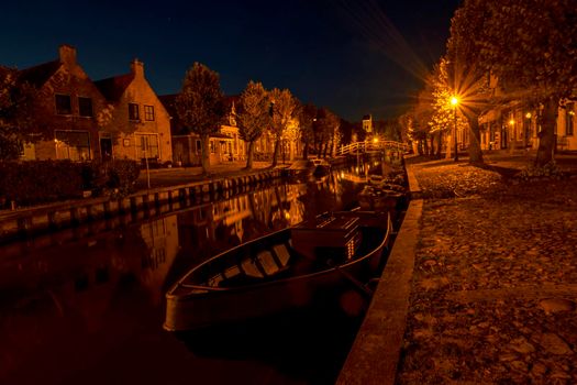 The historical city Sloten in Friesland the Netherlands by night