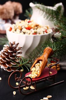 Sleigh with a scoop of wheat for kutia . Traditional Christmas sweet meal in Ukraine, Belarus and Poland