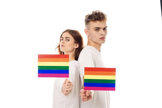 young couple lgbt Flag transgender lifestyle light background. High quality photo