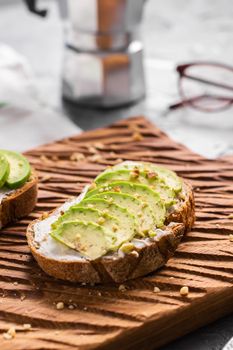 sliced avocado on toast bread with spices.