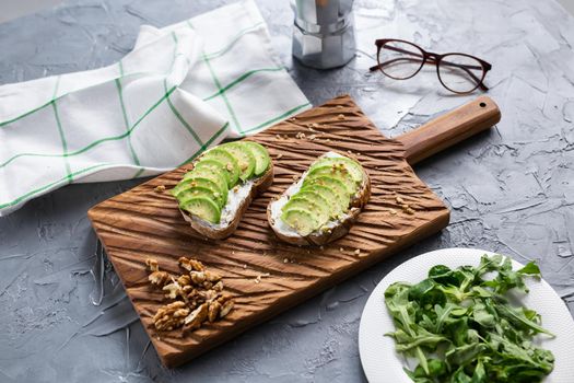 sliced avocado on toast bread with spices.