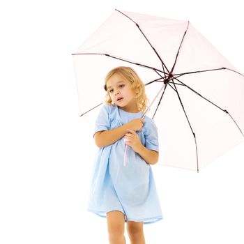 A beautiful little girl hid under an umbrella. The concept of summer vacation, style and fashion. Isolated on white background.