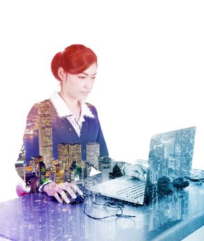 Double exposure of business woman working with laptop against the city isolated on white background