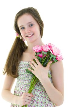 Little girl with a beautiful bouquet of flowers. The concept of holidays, family and children. Isolated on white background.