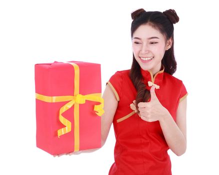 young woman holding red gift box in concept of happy chinese new year isolated on a white background